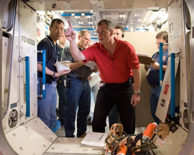 NASA image: Expedition 22 crew member Soichi Noguchi performing emergency procedure training.