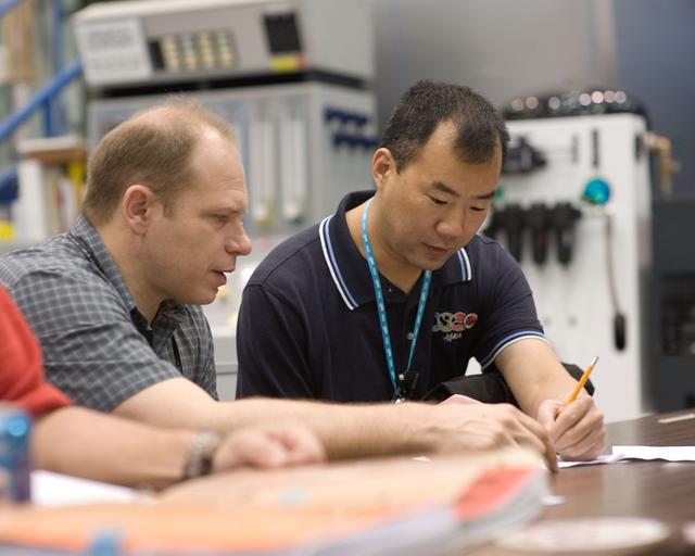 NASA image: Expedition 22 crew member Soichi Noguchi performing emergency procedure training.