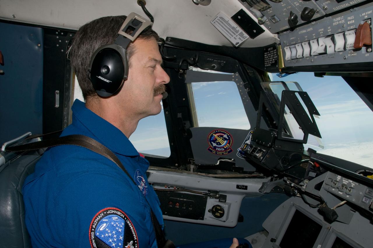 JSC2009-E-054052 (4 March 2009) --- Astronaut Scott Altman, STS-125 commander, flies a Shuttle Training Aircraft (STA) over White Sands Test Facility, New Mexico, during a training session. Photo Credit: Richard N. Clark, AOD division chief