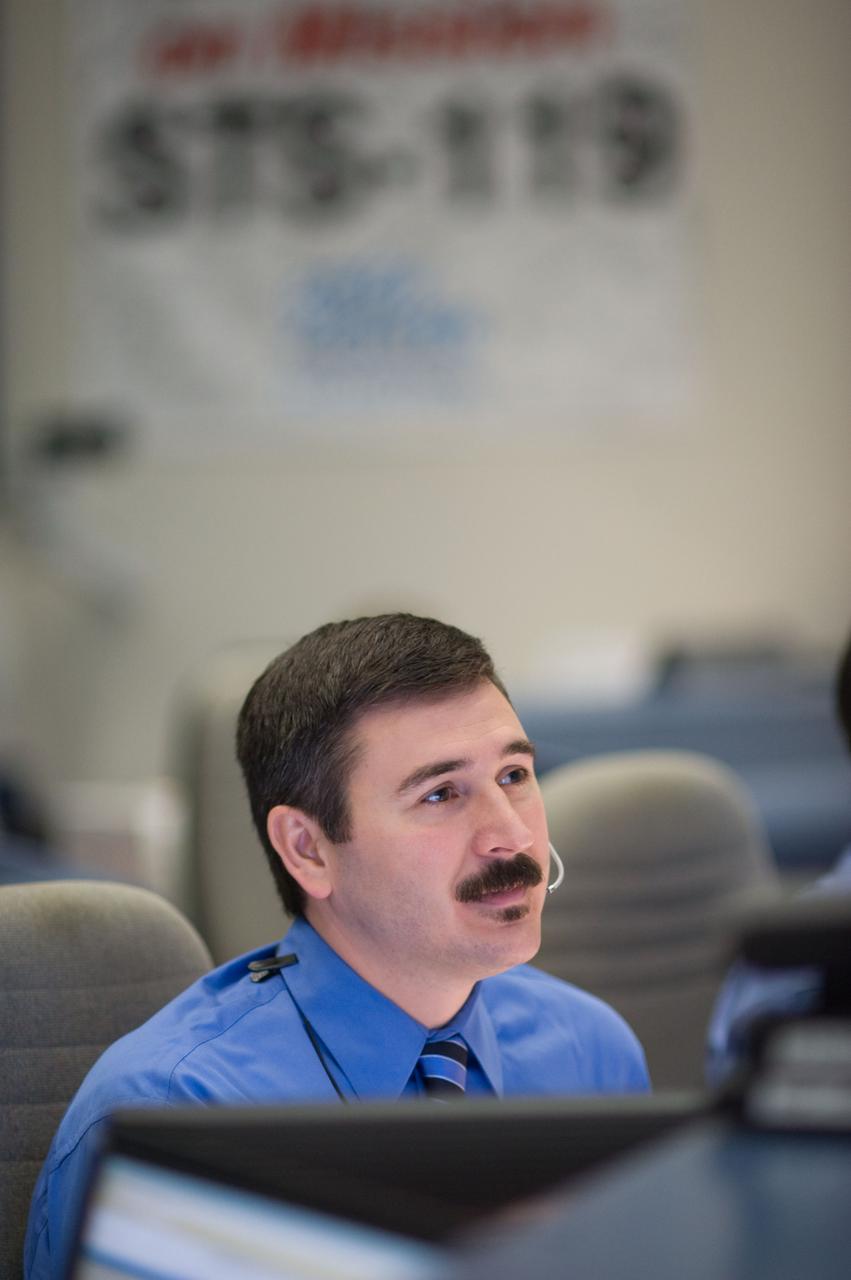 STS-119 flight controllers during undocking.  Photo Date: 3/25/09. Bldg. 30s - WFCR.  Photographer: Robert Markowitz