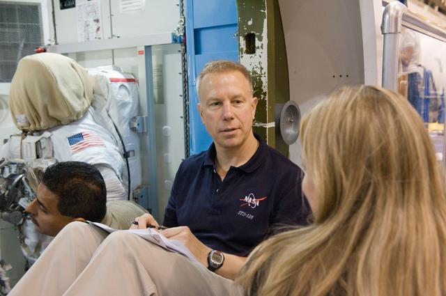NASA image: Preflight coverage of STS-128 & Expedition 20 crews training in ISS Airlock mockup. 