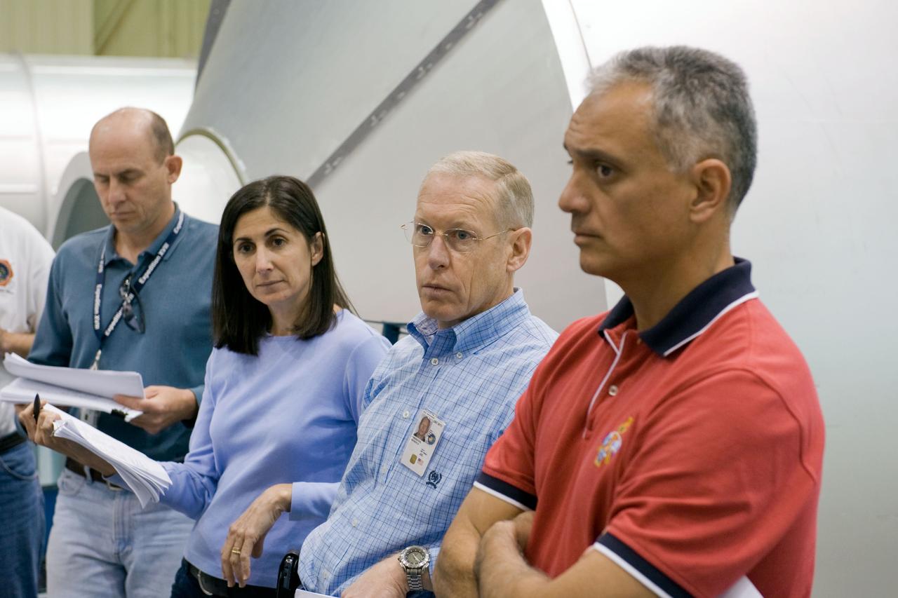 PHOTO DATE: 04-20-09 LOCATION: Bldg 9NW, ISS Mockup, Airlock SUBJECT: Preflight Coverage, STS 128 & Expedition 20 crews training in ISS Airlock mockup, Bldg 9NW PHOTOGRAPHER: BLAIR