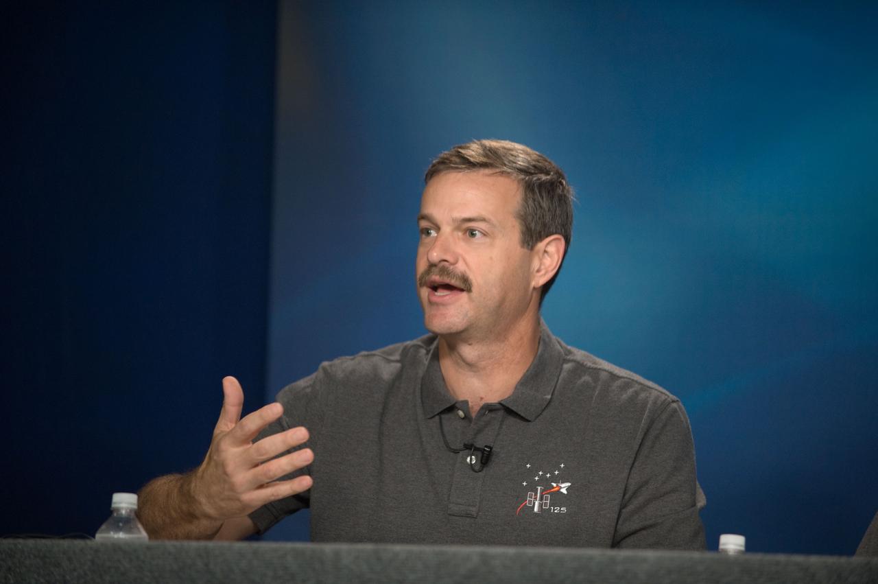 JSC2009-E-087202 (23 April 2009) --- Astronaut Scott Altman, STS-125 commander, responds to a question from a reporter during a STS-125 preflight press briefing at NASA's Johnson Space Center.