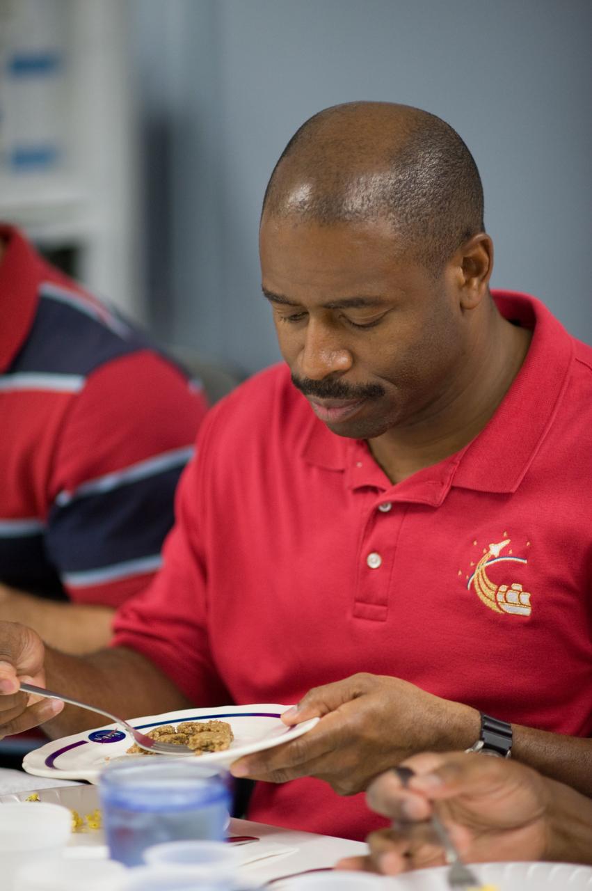 JSC2009-E-107047 (4 May 2009) --- Astronaut Leland Melvin, STS-129 mission specialist, participates in a food tasting session in the Habitability and Environmental Factors Office at NASA's Johnson Space Center.