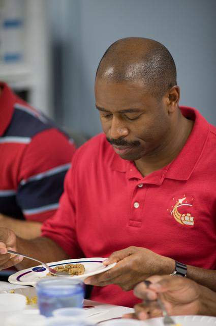 NASA image: STS-129 food tasting  session.