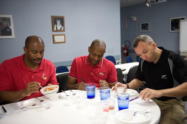 NASA image: STS-129 food tasting  session.