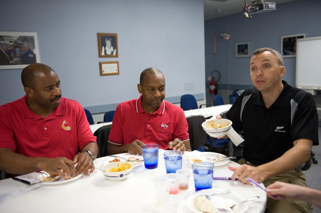 JSC2009-E-107052 (4 May 2009) --- Astronauts Leland Melvin (left), Robert Satcher and Randy Bresnik, all STS-129 mission specialists, participate in a food tasting session in the Habitability and Environmental Factors Office at NASA's Johnson Space Center.
