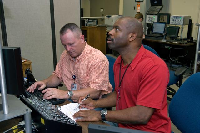 NASA image: STS-129 crew training in the JSC VR lab during SSRMS refresher training. 