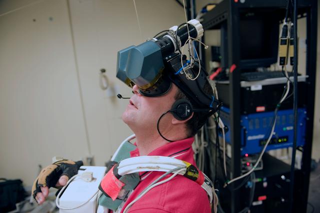 NASA image: STS-129 crew training in the JSC VR lab during SSRMS refresher training. 