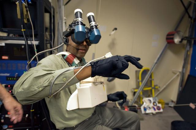 NASA image: STS-129 crew training in the JSC VR lab during SSRMS refresher training. 