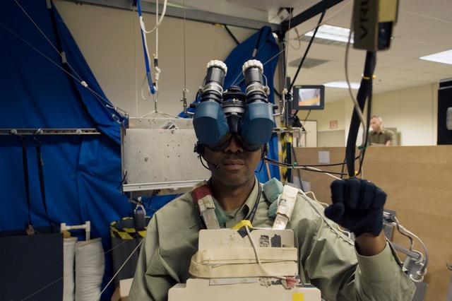 NASA image: STS-129 crew training in the JSC VR lab during SSRMS refresher training. 