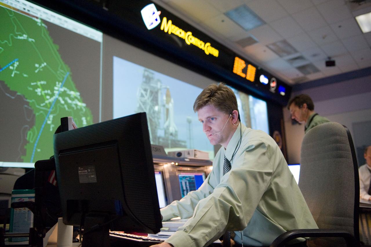 JSC2009-E-118817 (11 May 2009) --- Flight controller Mark McDonald monitors data at his console in the space shuttle flight control room in the Mission Control Center at NASA's Johnson Space Center during  launch countdown activities a few hundred miles away in Florida, site of Space Shuttle Atlantis? scheduled STS-125 launch to service the Hubble Space Telescope. Liftoff was on time at 2:01 p.m. (EDT) on May 11, 2009 from launch pad 39A at NASA's Kennedy Space Center.