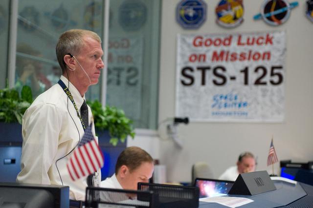 NASA image: STS-125 Flight Controllers on Console - (Orbit Shift)