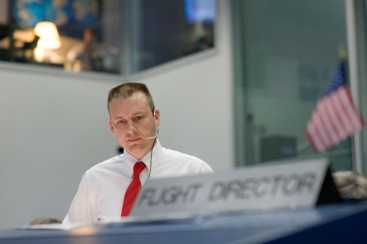 JSC2009-E-118882 (11 May 2009) --- Flight director Norm Knight is pictured in the space shuttle flight control room in the Mission Control Center at NASA's Johnson Space Center during launch countdown activities a few hundred miles away in Florida, site of Space Shuttle Atlantis? scheduled STS-125 launch to service the Hubble Space Telescope. Liftoff was on time at 2:01 p.m. (EDT) on May 11, 2009 from launch pad 39A at NASA's Kennedy Space Center.