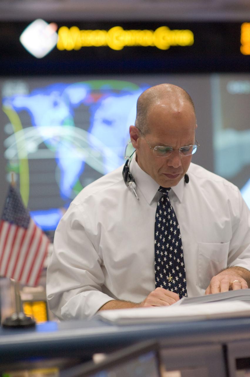 JSC2009-E-118883 (11 May 2009) --- Flight director Tony Ceccacci is pictured in the space shuttle flight control room in the Mission Control Center at NASA's Johnson Space Center during launch countdown activities a few hundred miles away in Florida, site of Space Shuttle Atlantis? scheduled STS-125 launch to service the Hubble Space Telescope. Liftoff was on time at 2:01 p.m. (EDT) on May 11, 2009 from launch pad 39A at NASA's Kennedy Space Center.