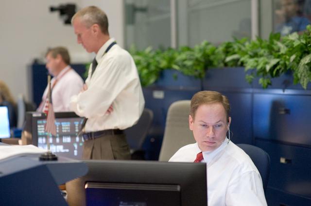 NASA image: STS-125 Flight Controllers on Console - (Orbit Shift)