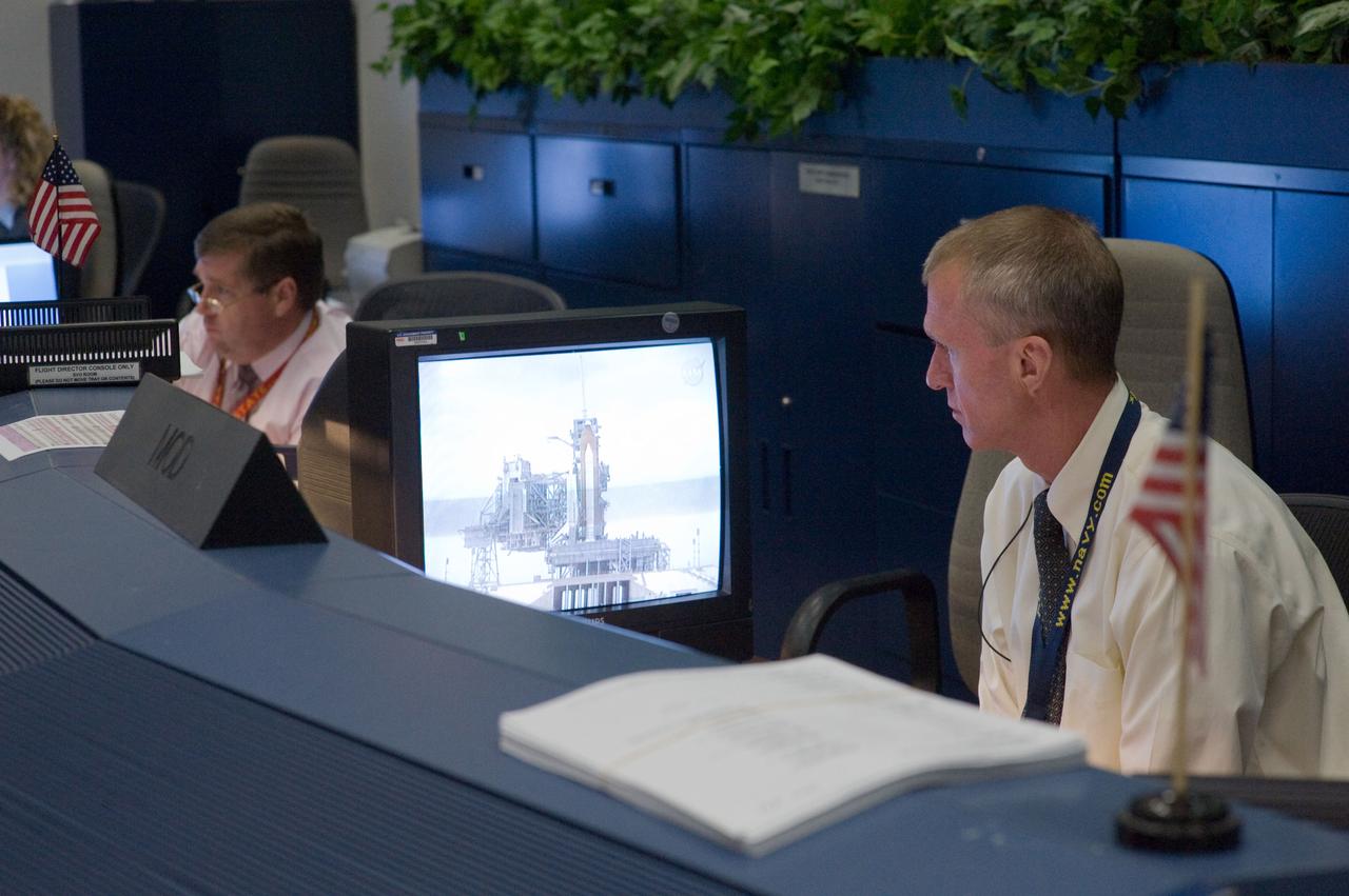 JSC2009-E-118885 (11 May 2009) --- Brent Jett, director, flight crew operations, watches a monitor at his console in the space shuttle flight control room in the Mission Control Center at NASA's Johnson Space Center during launch countdown activities a few hundred miles away in Florida, site of Space Shuttle Atlantis? scheduled STS-125 launch to service the Hubble Space Telescope. Liftoff was on time at 2:01 p.m. (EDT) on May 11, 2009 from launch pad 39A at NASA's Kennedy Space Center.
