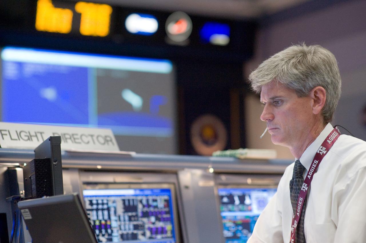 JSC2009-E-118888 (11 May 2009) --- Flight director Bryan Lunney monitors data at his console in the space shuttle flight control room in the Mission Control Center at NASA's Johnson Space Center during launch countdown activities a few hundred miles away in Florida, site of Space Shuttle Atlantis? scheduled STS-125 launch to service the Hubble Space Telescope. Liftoff was on time at 2:01 p.m. (EDT) on May 11, 2009 from launch pad 39A at NASA's Kennedy Space Center.