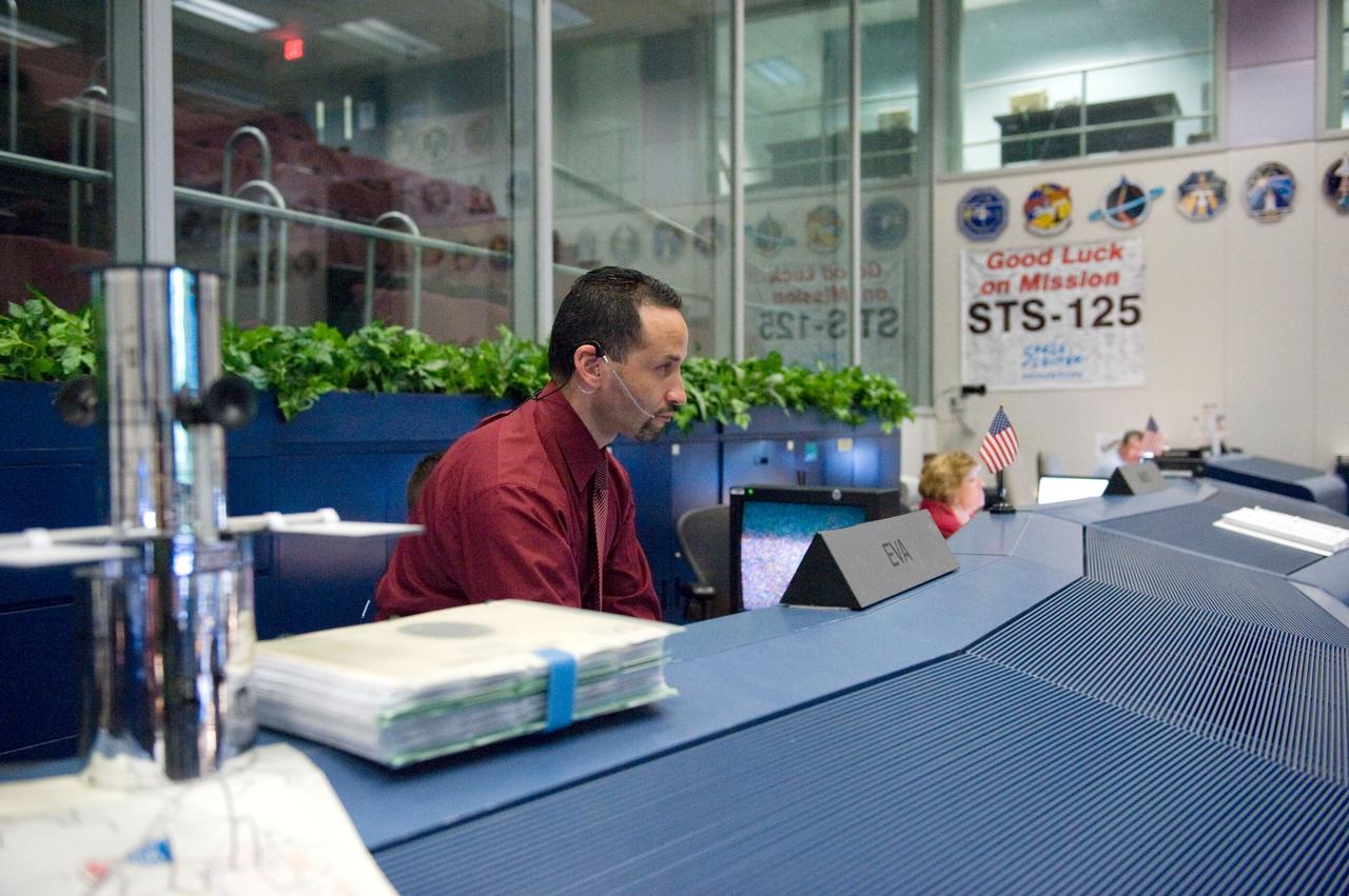 JSC2009-E-120480 (14 May 2009) --- Tomas Gonzalez-Torres, STS-125 lead spacewalk officer, monitors data at his console in the space shuttle flight control room in the Mission Control Center at NASA's Johnson Space Center during flight day four activities.