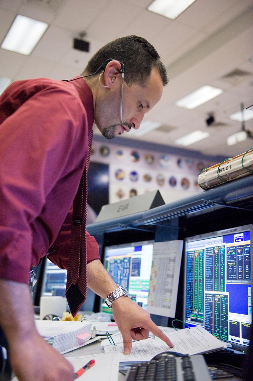 JSC2009-E-120486 (14 May 2009) --- Tomas Gonzalez-Torres, STS-125 lead spacewalk officer, monitors data at his console in the space shuttle flight control room in the Mission Control Center at NASA's Johnson Space Center during flight day four activities.
