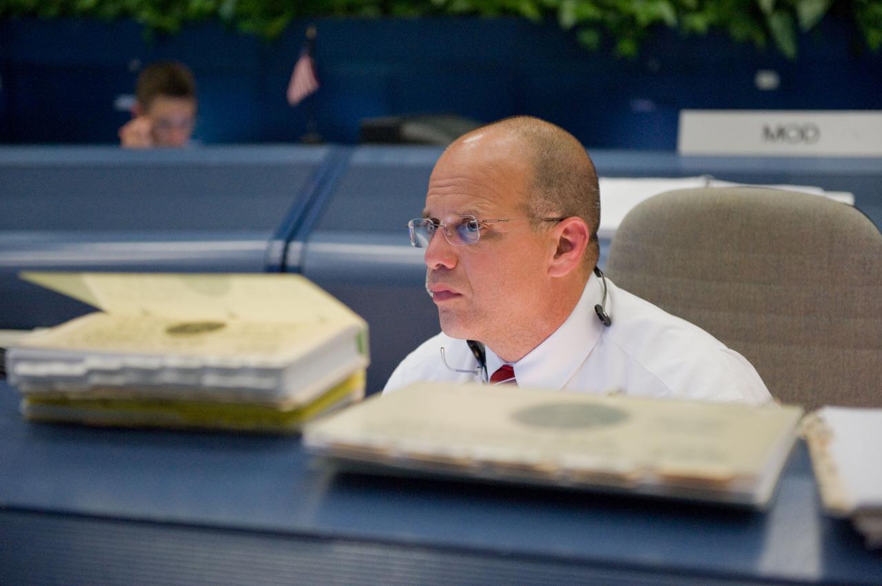 JSC2009-E-120490 (14 May 2009) --- Flight director Tony Ceccacci watches the big screens from his console in the space shuttle flight control room in the Mission Control Center at NASA's Johnson Space Center during STS-125 flight day four activities.