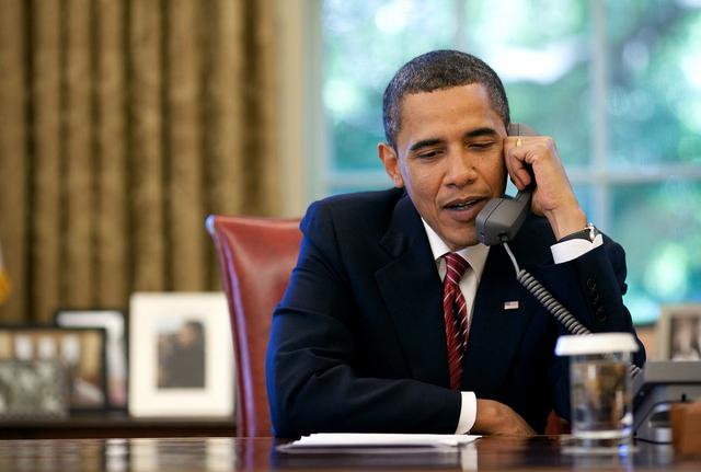 JSC2009-E-121338 (20 May 2009) --- President Barack Obama talks to the crew of the STS-125 mission, orbiting Earth aboard the Space Shuttle Atlantis the day after the crew released the freshly serviced Hubble Space Telescope. Photo credit: NASA/White House/Pete Souza