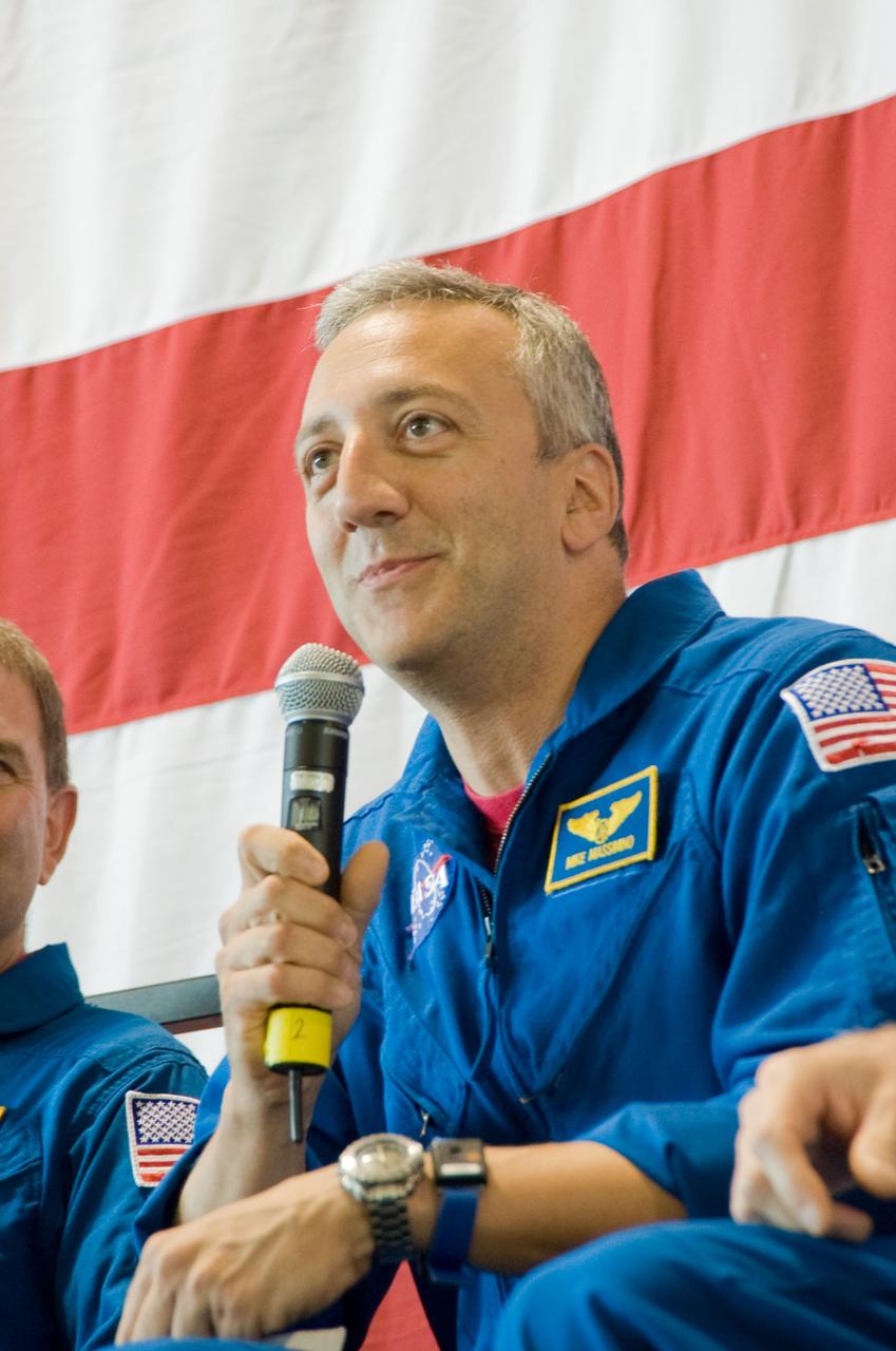 JSC2009-E-122173 (26 May 2009) --- Astronaut Mike Massimino, STS-125 mission specialist, addresses a large crowd of well-wishers at the STS-125 crew return ceremony on May 26, 2009 at Ellington Field near NASA?s Johnson Space Center.