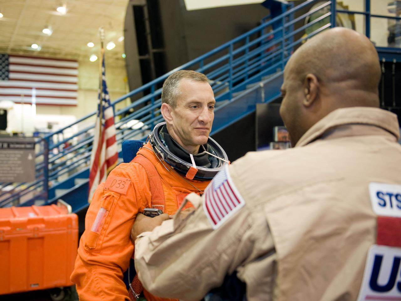PHOTO DATE:  05-28-09 LOCATION: Bldg 9NW, FFT SUBJECT: Photographic coverage of STS-129 Preflight Training. Suited payload egress training. PHOTOGRAPHER:  James Blair