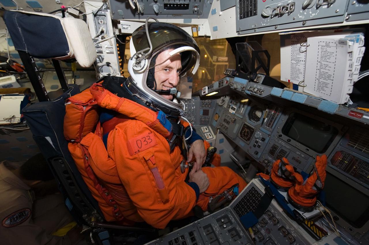 PHOTO DATE:  05-28-09 LOCATION: Bldg 9NW, FFT SUBJECT: Photographic coverage of STS-129 Preflight Training. Suited payload egress training. PHOTOGRAPHER:  James Blair