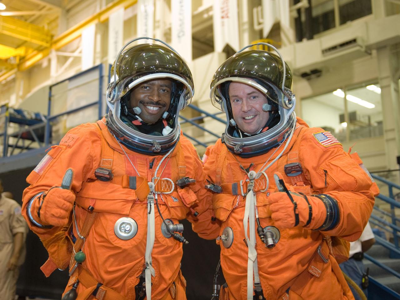 PHOTO DATE:  05-28-09 LOCATION: Bldg 9NW, FFT SUBJECT: Photographic coverage of STS-129 Preflight Training. Suited payload egress training. PHOTOGRAPHER:  James Blair