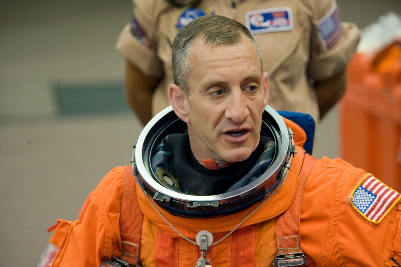 PHOTO DATE:  05-28-09 LOCATION: Bldg 9NW, FFT SUBJECT: Photographic coverage of STS-129 Preflight Training. Suited payload egress training. PHOTOGRAPHER:  James Blair
