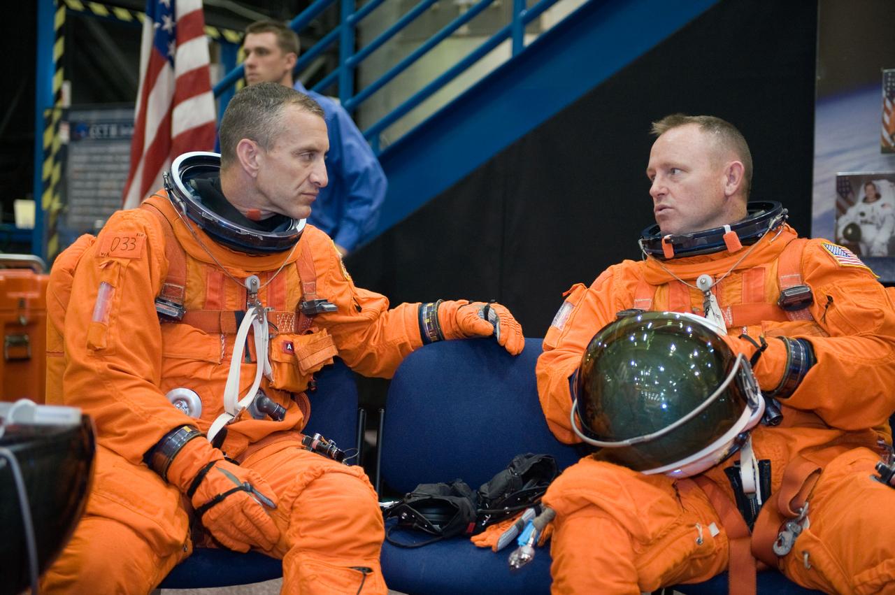 PHOTO DATE:  05-28-09 LOCATION: Bldg 9NW, FFT SUBJECT: Photographic coverage of STS-129 Preflight Training. Suited payload egress training. PHOTOGRAPHER:  James Blair