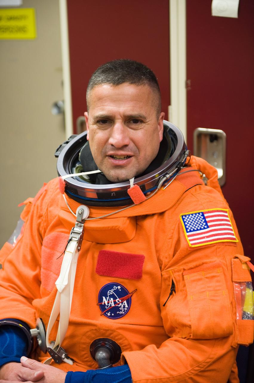 JSC2009-E-125126 (1 June 2009) --- Astronaut George Zamka, STS-130 commander, attired in a training version of his shuttle launch and entry suit, awaits the start of a training session in the Space Vehicle Mock-up Facility at NASA?s Johnson Space Center.