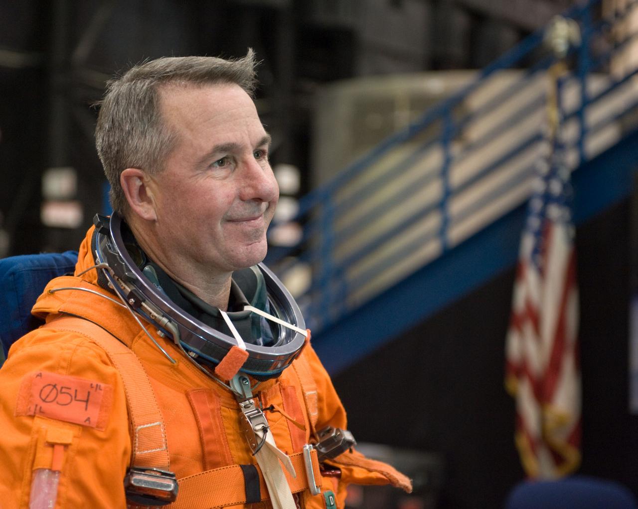 JSC2009-E-125141 (1 June 2009) --- Astronaut Stephen Robinson, STS-130 mission specialist, attired in a training version of his shuttle launch and entry suit, awaits the start of a training session in the Space Vehicle Mock-up Facility at NASA?s Johnson Space Center.