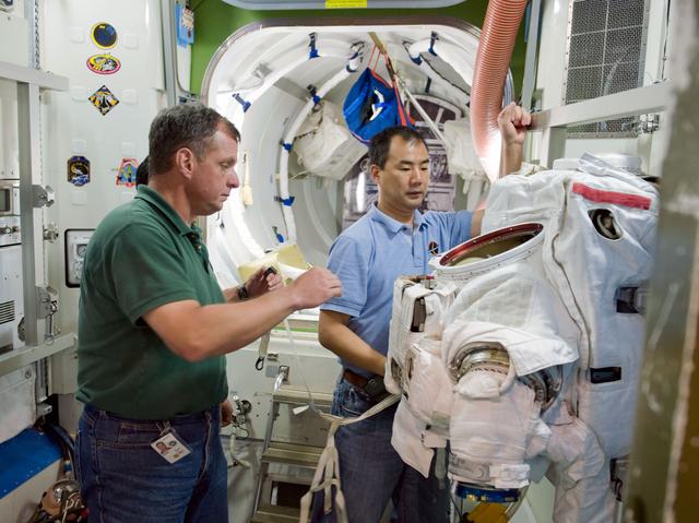 NASA image: Expedition 22 crew member TJ Creamerand, JAXA astronaut Soichi Noguchi and Expedition 28 crew member Satoshi Furukawa