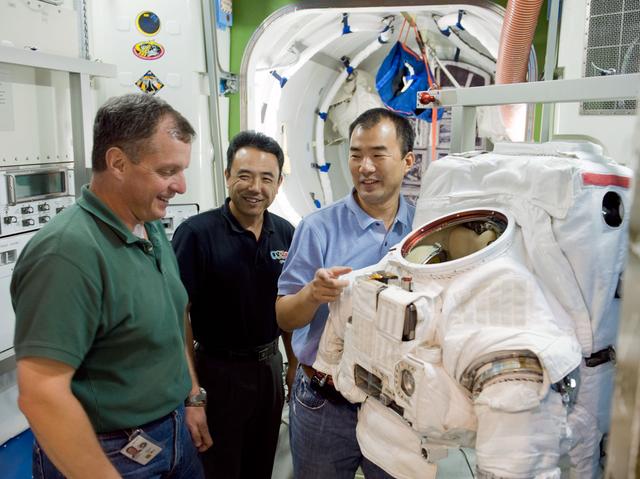 NASA image: Expedition 22 crew member TJ Creamerand, JAXA astronaut Soichi Noguchi and Expedition 28 crew member Satoshi Furukawa 