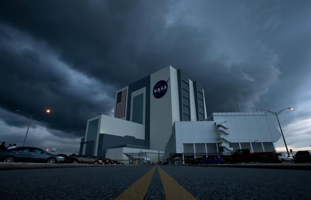 NASA image: Storm Clouds Roll In Over The Vehicle Assembly Building