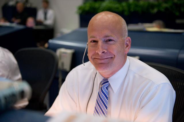 NASA image: STS-127 MER Flight Controllers on Console During Scrubbed Launch Attempt 