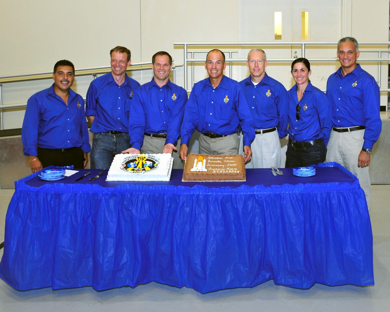 STS-128 cake-cutting celebrating the completion of mission training.