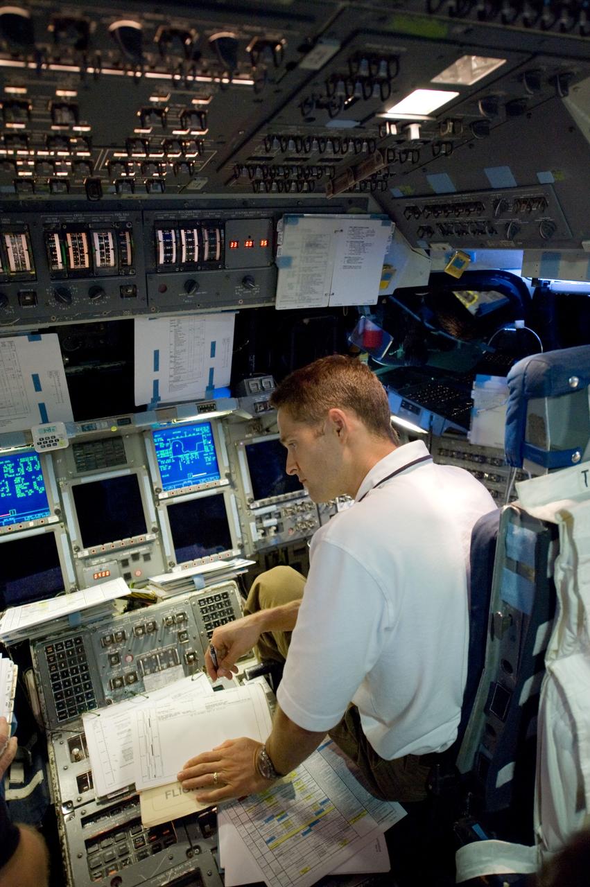 JSC2009-E-207317 (11 Sept. 2009) --- NASA astronaut James P. Dutton Jr., STS-131 pilot, occupies the pilot?s station during a training session in the shuttle mission simulator (SMS) in the Jake Garn Simulation and Training Facility at NASA?s Johnson Space Center.