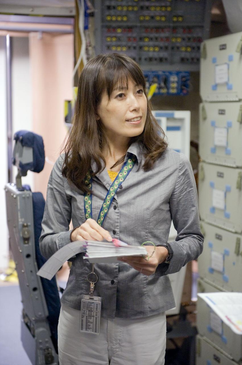 JSC2009-E-207346 (11 Sept. 2009) --- Japan Aerospace Exploration Agency (JAXA) astronaut Naoko Yamazaki, STS-131 mission specialist, participates in a training session in the shuttle mission simulator (SMS) in the Jake Garn Simulation and Training Facility at NASA?s Johnson Space Center.
