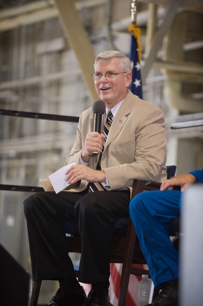 JSC2009-E-207800 (12 Sept. 2009) --- NASA's Johnson Space Center (JSC) director Michael L. Coats addresses a large crowd of well-wishers at the STS-128 crew return ceremony on Sept. 12, 2009 at Ellington Field near JSC.
