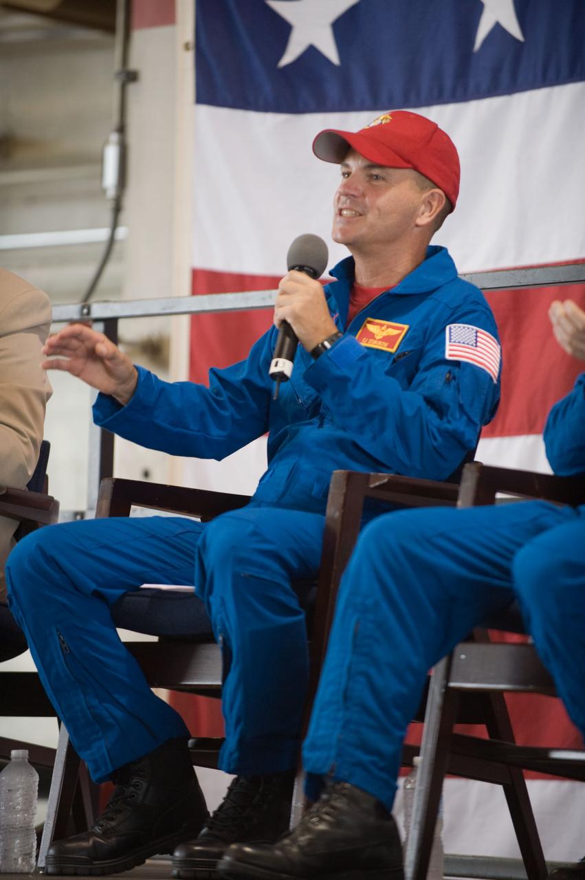 JSC2009-E-207807 (12 Sept. 2009) --- NASA astronaut Rick Sturckow, STS-128 commander, addresses a large crowd of well-wishers at the STS-128 crew return ceremony on Sept. 12, 2009 at Ellington Field near NASA's Johnson Space Center.
