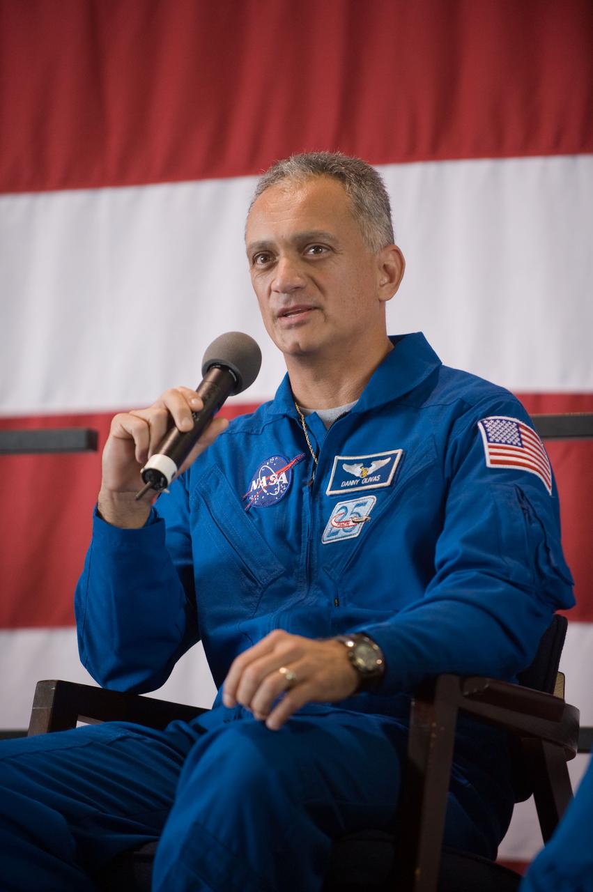 JSC2009-E-207819 (12 Sept. 2009) --- NASA astronaut John ?Danny? Olivas, STS-128 mission specialist, addresses a large crowd of well-wishers at the STS-128 crew return ceremony on Sept. 12, 2009 at Ellington Field near NASA's Johnson Space Center.