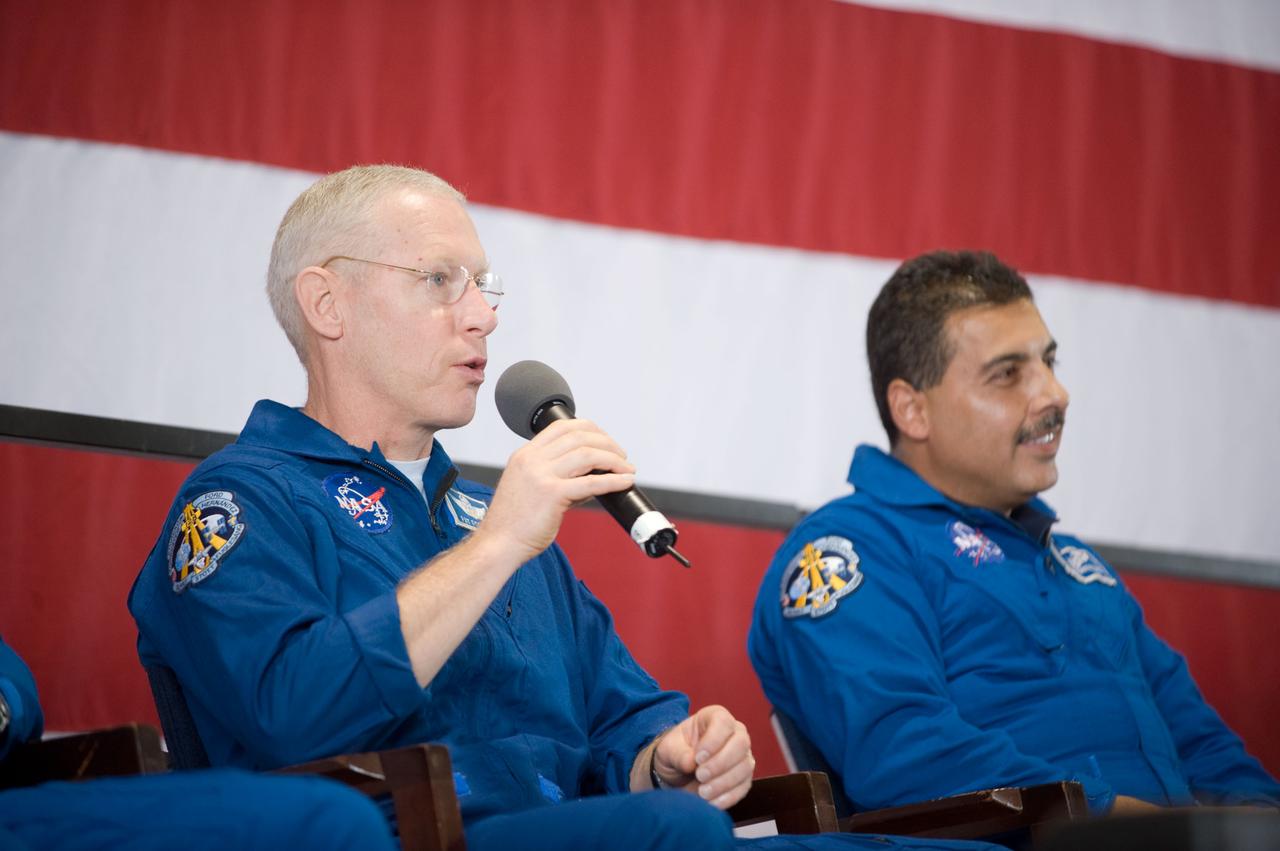 JSC2009-E-207847 (12 Sept. 2009) --- NASA astronaut Patrick Forrester, STS-128 mission specialist, addresses a large crowd of well-wishers at the STS-128 crew return ceremony on Sept. 12, 2009 at Ellington Field near NASA's Johnson Space Center. Astronaut Jose Hernandez, mission specialist, is at right.