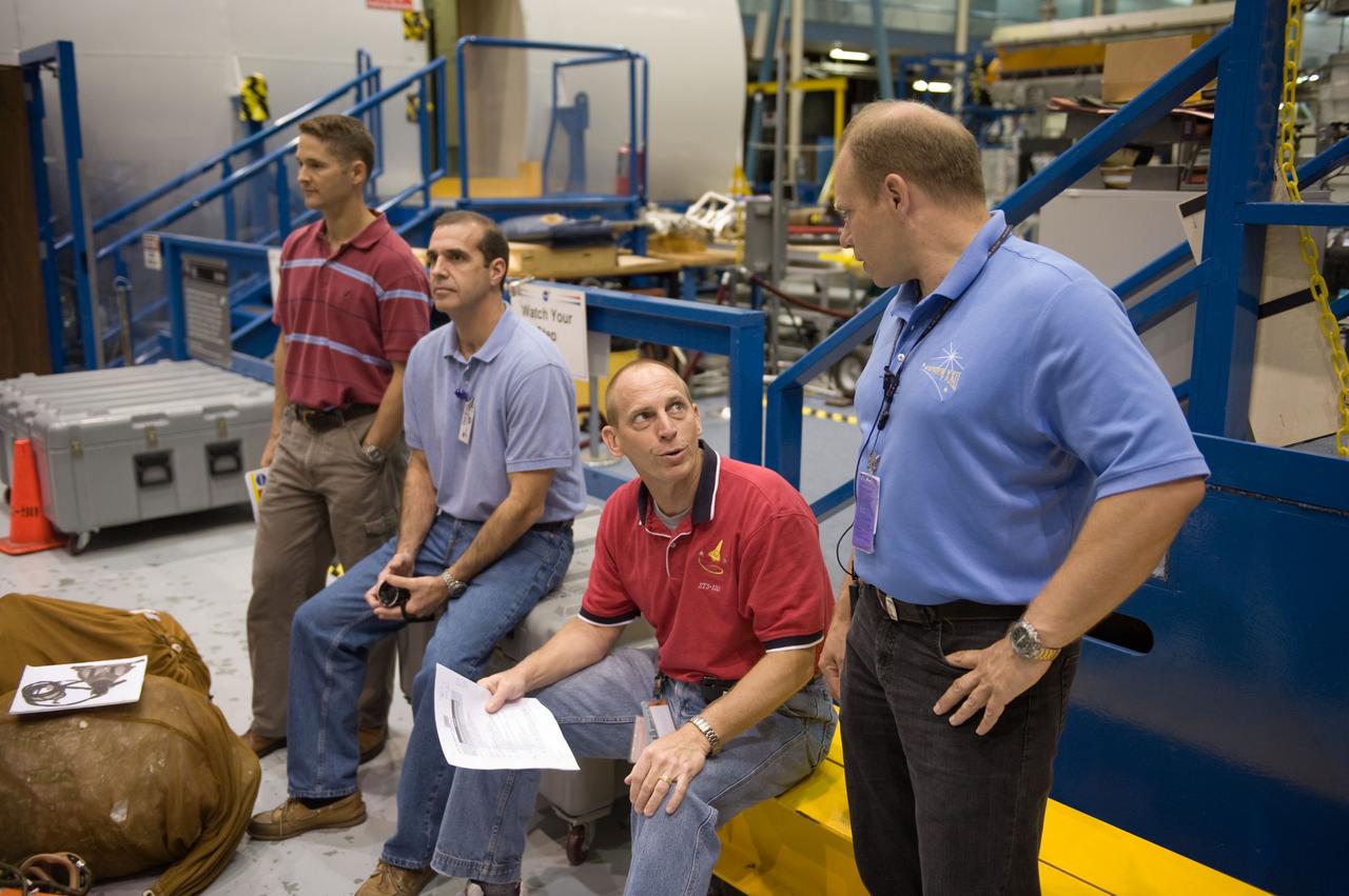 JSC2009-E-207887 (15 Sept. 2009) --- NASA astronauts James P. Dutton Jr. (left), STS-131 pilot; Rick Mastracchio and Clay Anderson, both mission specialists; along with Russian cosmonaut Oleg Kotov, Expedition 22 flight engineer and Expedition 23 commander, participate in a training session in the Space Vehicle Mock-up Facility at NASA's Johnson Space Center.