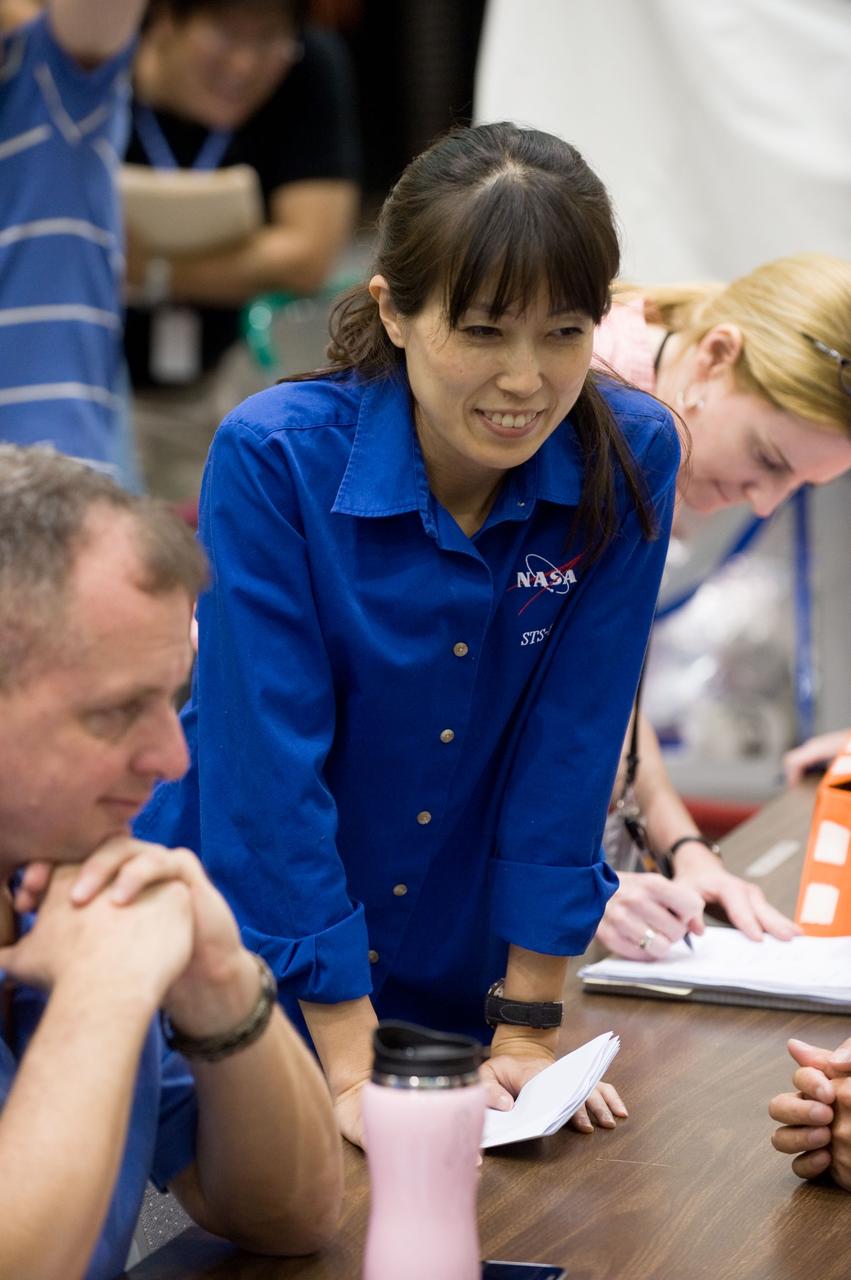 JSC2009-E-207906 (15 Sept. 2009) --- Japan Aerospace Exploration Agency (JAXA) astronaut Naoko Yamazaki, STS-131 mission specialist; and NASA astronaut T.J. Creamer, Expedition 22/23 flight engineer, are pictured during a training session in the Space Vehicle Mock-up Facility at NASA's Johnson Space Center.