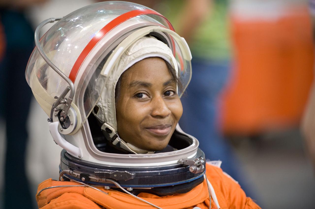 JSC2009-E-208908 (17 Sept. 2009) --- NASA astronaut Stephanie Wilson, STS-131 mission specialist, attired in a training version of her shuttle launch and entry suit, is pictured during a water survival training session in the Neutral Buoyancy Laboratory (NBL) near NASA's Johnson Space Center.