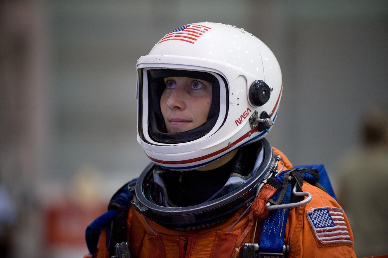 JSC2009-E-208978 (17 Sept. 2009) --- NASA astronaut Dorothy Metcalf-Lindenburger, STS-131 mission specialist, attired in a training version of her shuttle launch and entry suit, is pictured during a water survival training session in the Neutral Buoyancy Laboratory (NBL) near NASA's Johnson Space Center.