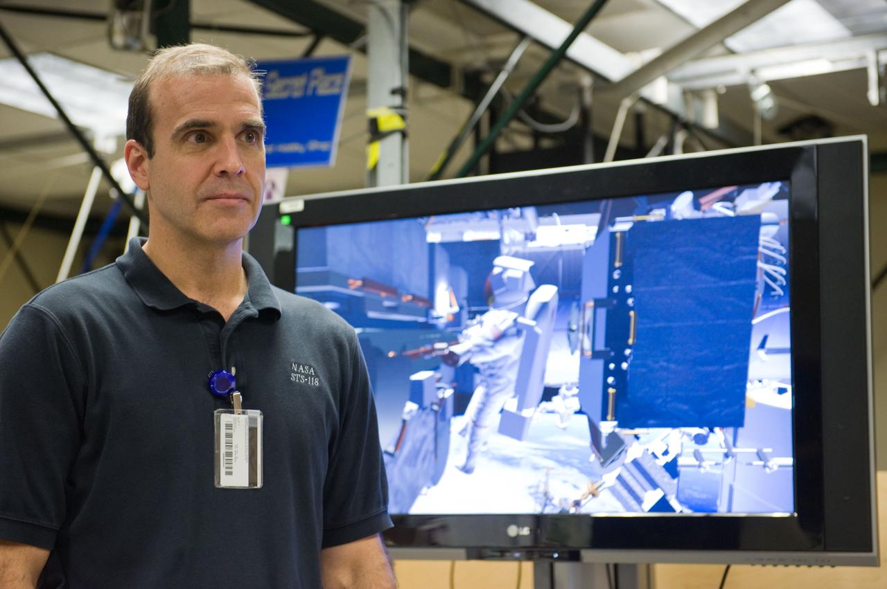 JSC2009-E-214327 (25 Sept. 2009) --- NASA astronaut Rick Mastracchio, STS-131 mission specialist, is pictured during a training session in the virtual reality lab in the Space Vehicle Mock-up Facility at NASA's Johnson Space Center to train for some of his duties aboard the space shuttle and space station.